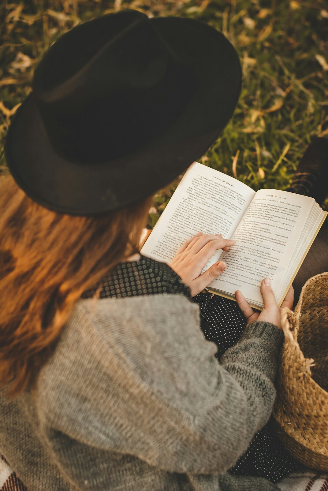 person reading self help book